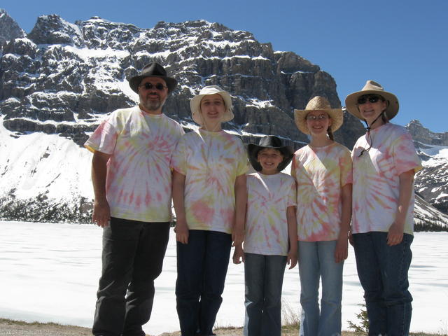 Family by snow in Banff National Park