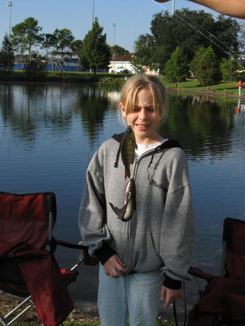 Alyssa with Mom and Dad's Fish
